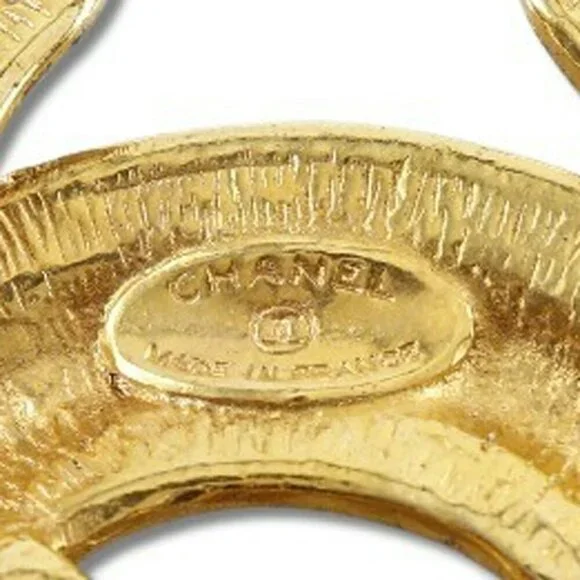 CHANEL Gold Logo Brooch